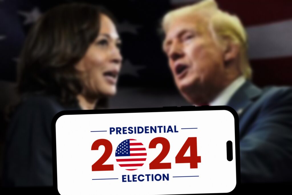 Donald Trump looking at Kamala Harris with '2024 election' sign underneath